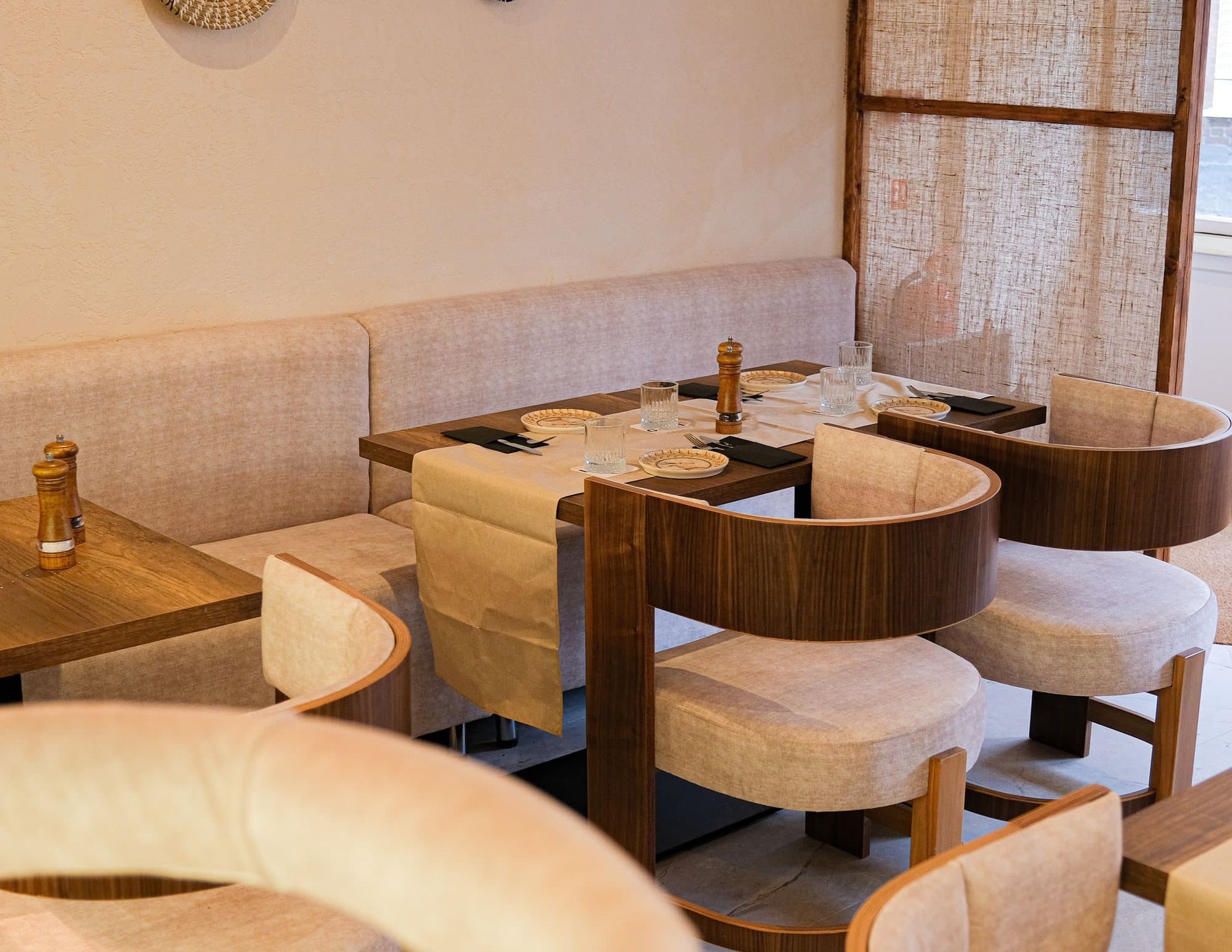 Curved banquette seating in the dining room at Lacco